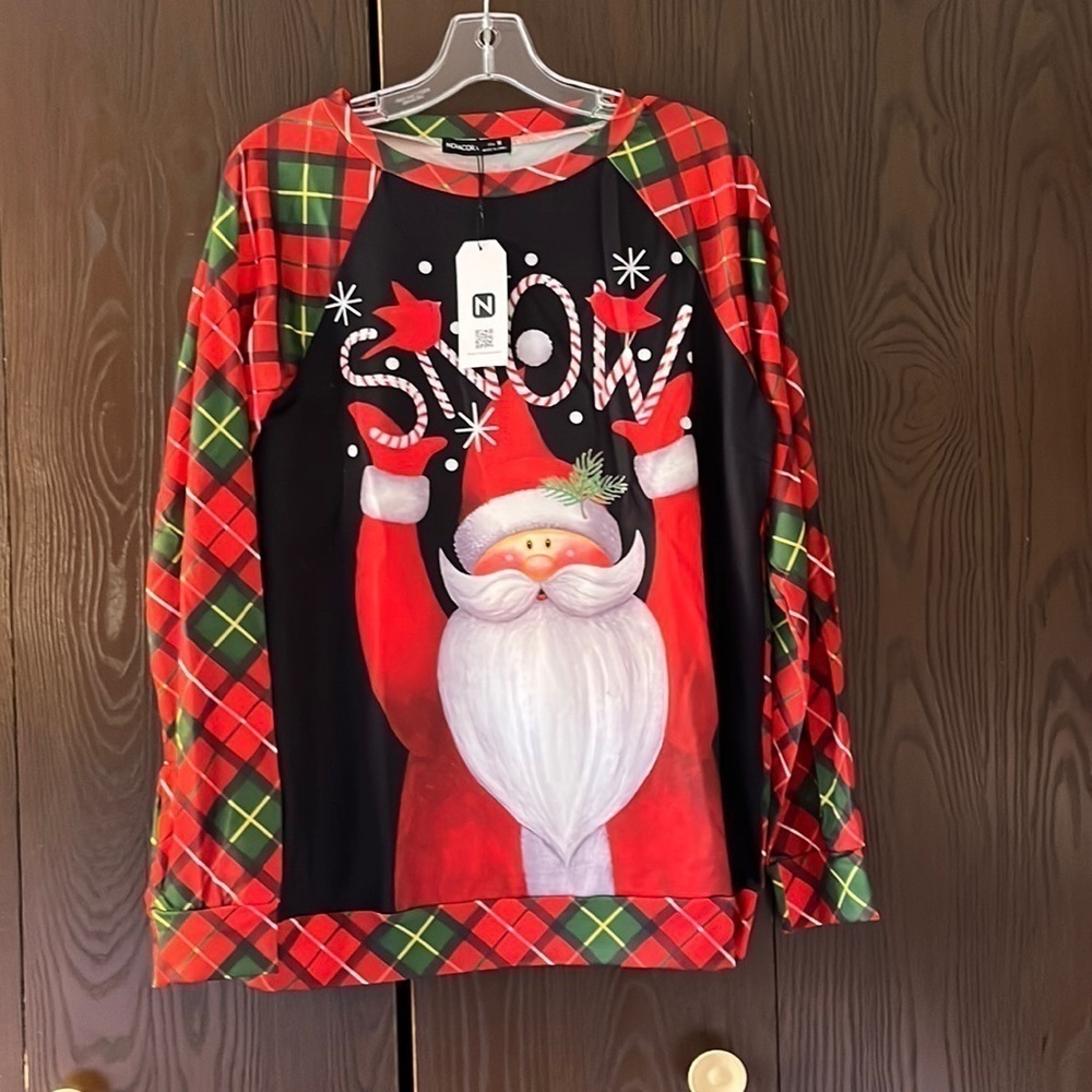Noracora Santa sweatshirt. Size Medium. New with tags.
